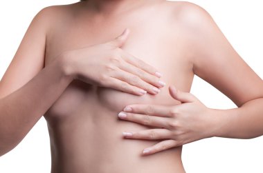 Young Asian adult woman examining her breast for lumps or signs clipart