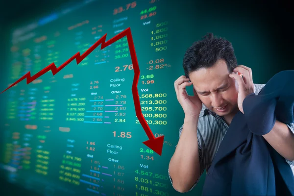 Hombre de negocios estrés sobre la caída del mercado de valores —  Fotos de Stock