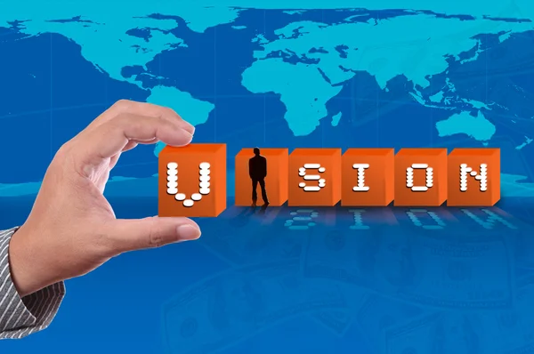 Business man pick up vision word push down on world map backgrou — Stock Photo, Image