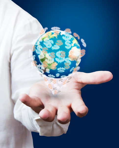 Dollar earth globe in zijn handen — Stockfoto