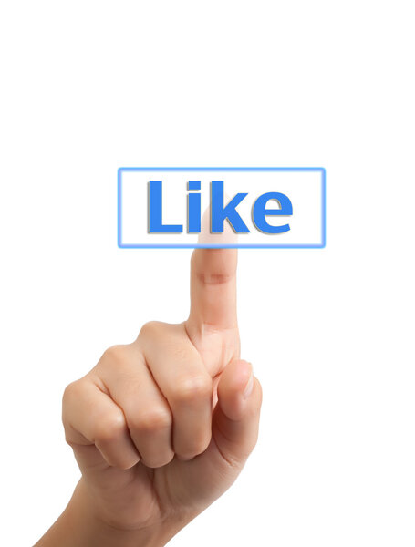 женская рука, нажавшая кнопку Like
