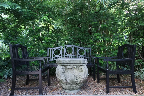 Stock image Chairs on backyard tropical garden