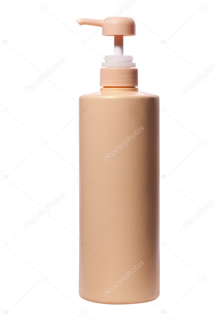 Plastic pump bottle of skin care product on white background