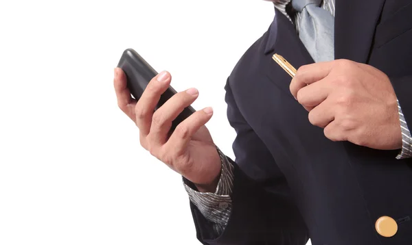 ビジネスの男性の携帯電話と彼のビジネスを処理するには — ストック写真