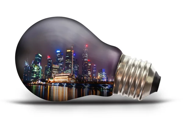 Light bulb with city scape at night — Stock Photo, Image