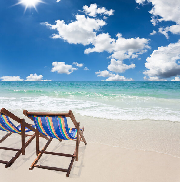 Beach chair on white sand beach