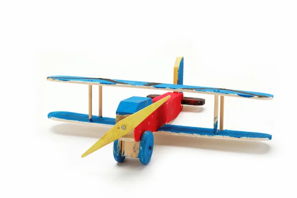 Children's creativity. Handmade wooden model airplane. — Stock Photo, Image