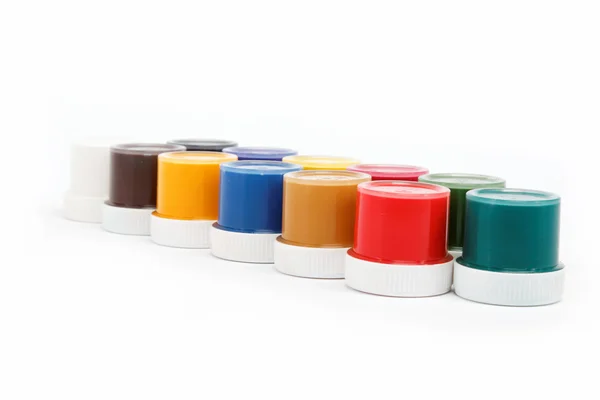 Cans of paint on a white background. — Stock Photo, Image