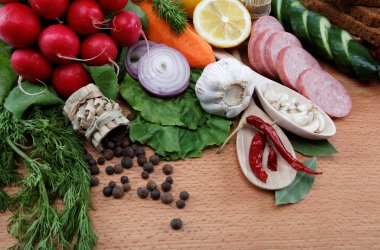 Healthy food. Fresh vegetables and fruits on a wooden table. clipart