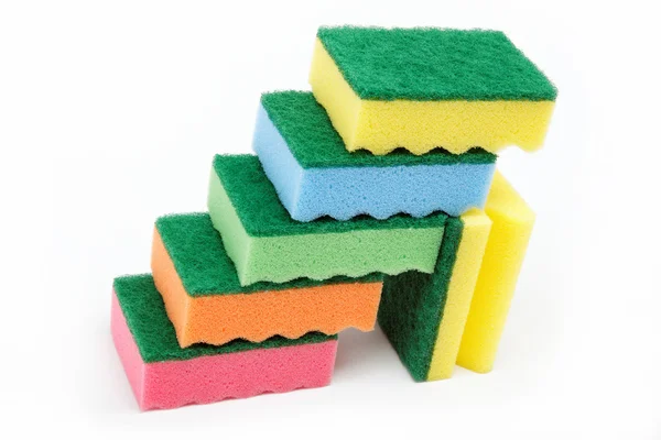 Stack of cleaning sponges on a white background. — Stock Photo, Image