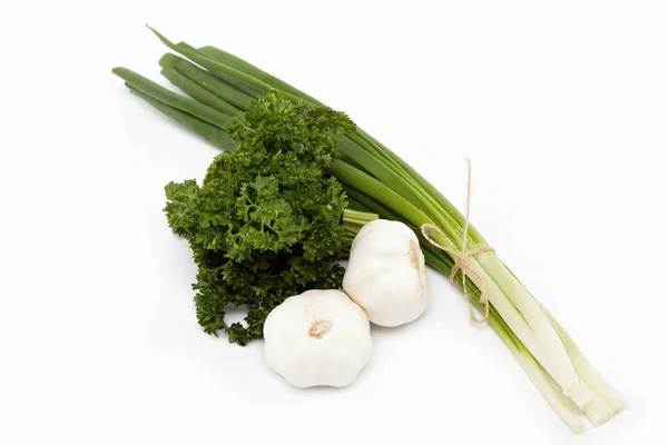 Fresh green onions, garlic and parsley isolated on white. — Stock Photo, Image