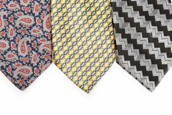 Luxusní kravaty izolovaných na bílém pozadí. — Stock fotografie