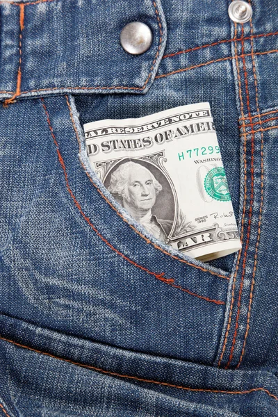Dollar bill i sin ficka jeans. — Stockfoto