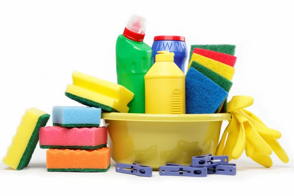 Capacity with cleaning supplies isolated on white background. — Stock Photo, Image