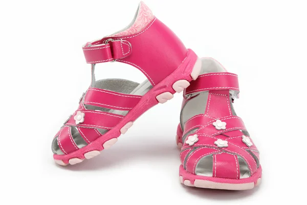 Růžové dětské sandály izolované na bílém — Stock fotografie