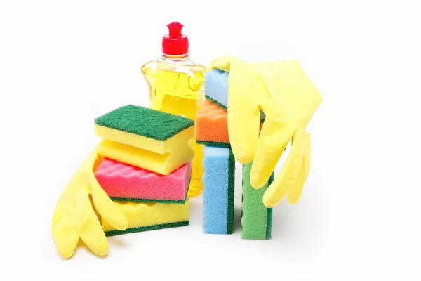Vaskemiddel flaske, gummihandsker og rengøring svamp på en hvid b - Stock-foto