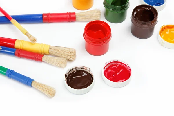 Brushes and paints isolated on a white background. — Stock Photo, Image