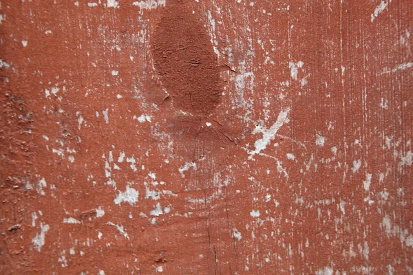 Holz mit abgesplitterter roter Farbe. Grunge-Stil Hintergrund — Stockfoto