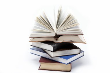 A stack of books on a white background. Open book. clipart