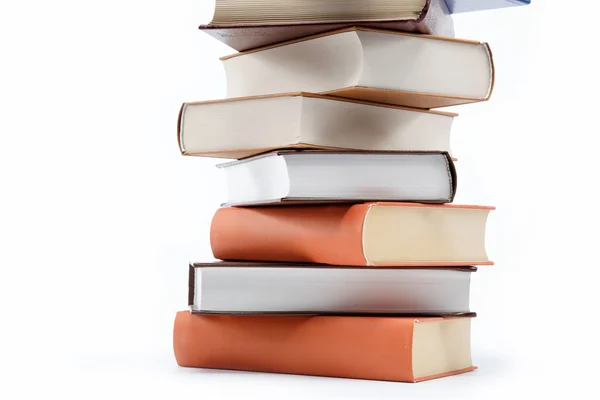 A stack of books on a white background. — Stock Photo, Image