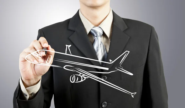 Homem de negócios desenhar transporte de avião — Fotografia de Stock