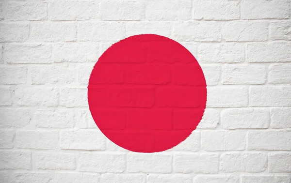 벽돌 벽에 일본 국기 — 스톡 사진