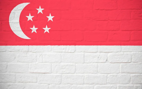 Σημαία της Σιγκαπούρης σε τοίχο από τούβλα — Φωτογραφία Αρχείου