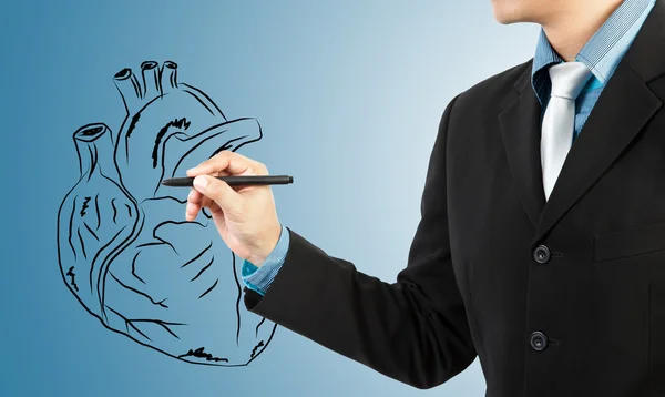 Hombre de negocios dibujo diagrama del corazón —  Fotos de Stock