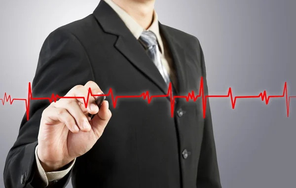 Business man drawing chart heartbeat — Stock Photo, Image