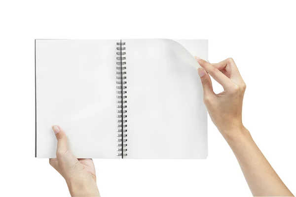 Libro de notas de página en blanco abierto y mano — Foto de Stock
