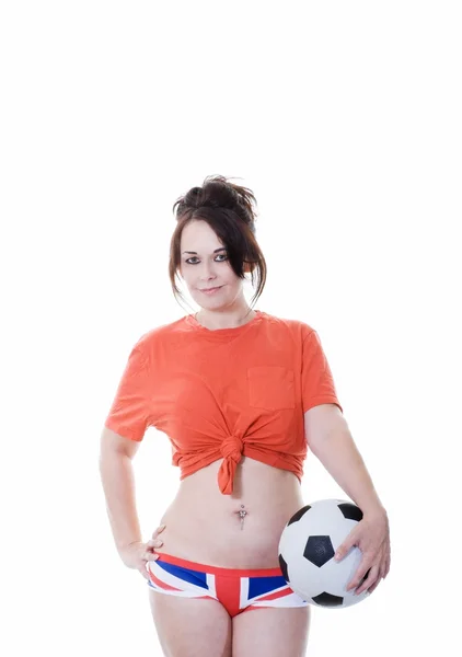 Vrouw met voetbal bal en union jack ondergoed — Stockfoto