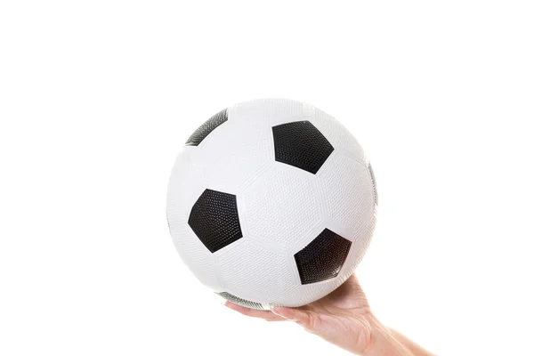 Femmes main tenant ballon de football — Photo