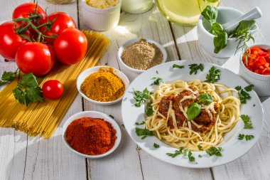 Ingredients and fresh vegetables to spaghetti clipart