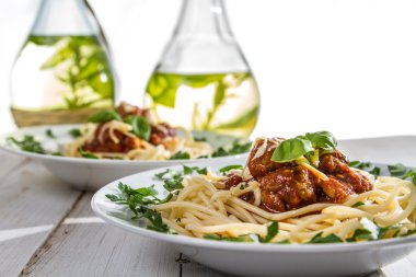 Closeup of a given spaghetti on a plate clipart