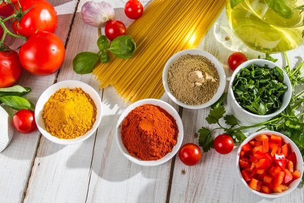 Ingredients and italian cuisine spices — Stock Photo, Image