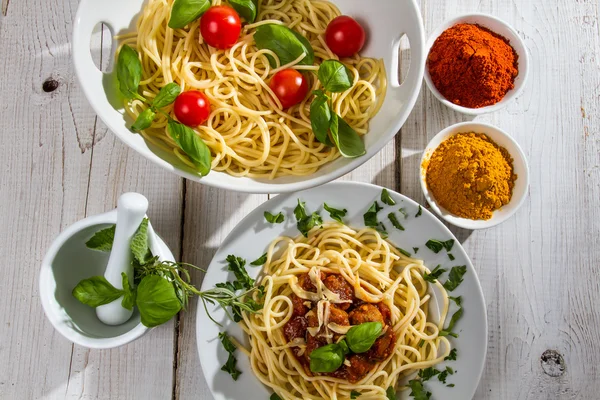 Vegetables, spices and spaghetti — Stock Photo, Image