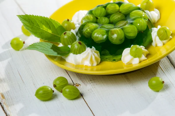 Dessert made ​​of jelly and gooseberries — Stock Photo, Image