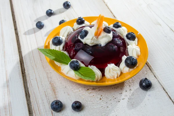 Fruit dessert with cream — Stock Photo, Image