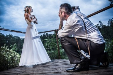 Photo session with the groom and bride clipart