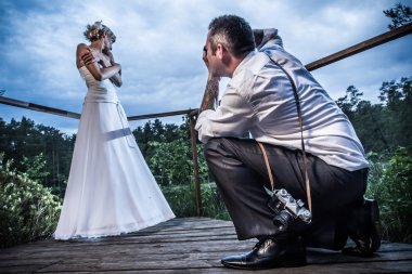 Photo session with the bride and groom clipart