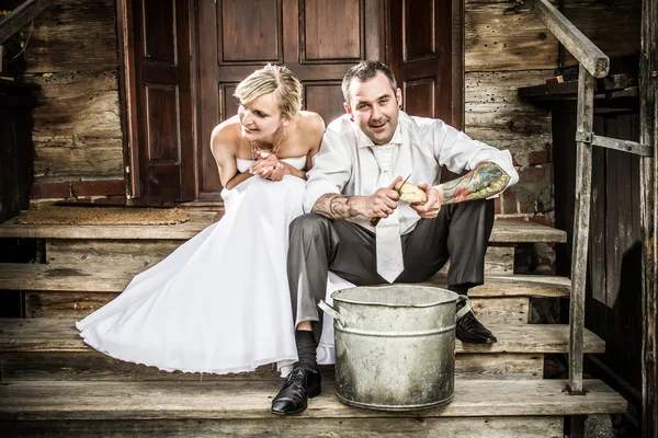 Happy young couple on the old porch — Stock Photo, Image