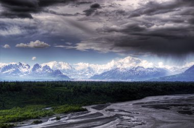 Denali with storm clouds clipart