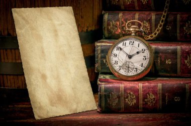 Old photo paper texture, pocket watch and books in Low-key clipart