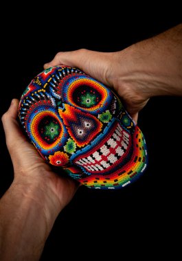 Beaded Skull with hands (Surprised) clipart