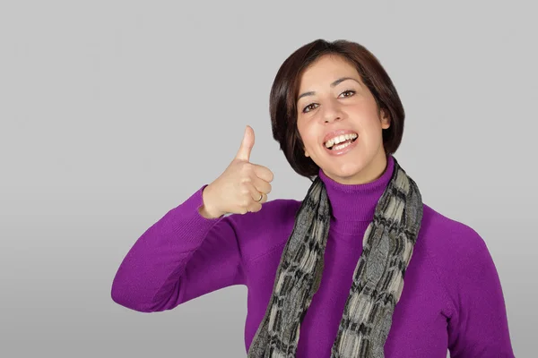 Woman with purple jacket and gray scarf — Stock Photo, Image