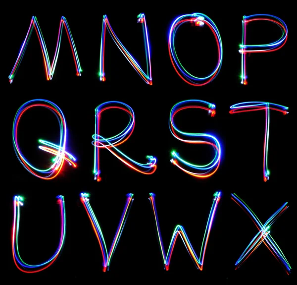 Handgeschreven neon licht alfabetten — Stockfoto