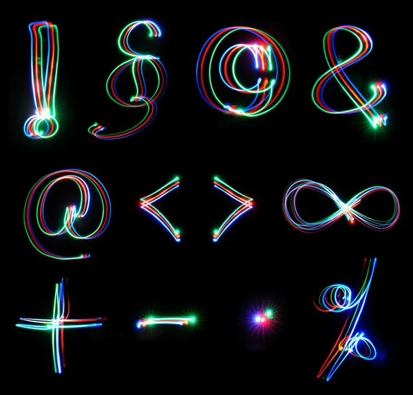 Alfabeti luminosi al neon manoscritti — Foto Stock