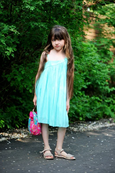 Portrait of child girl in turquoise dress — Stock Photo, Image