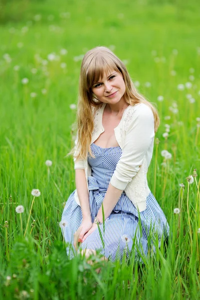 Outdoor portrait of beautiful young blond woman — Stock Photo, Image