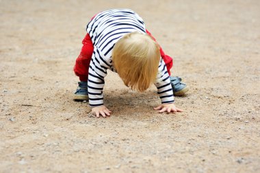 Baby boy trying to stand up clipart